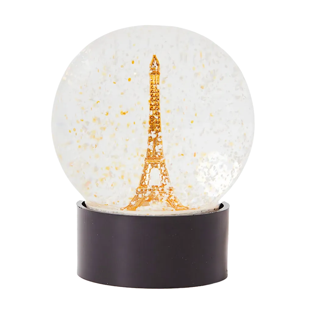 Glass snow globe golden Eiffel Tower